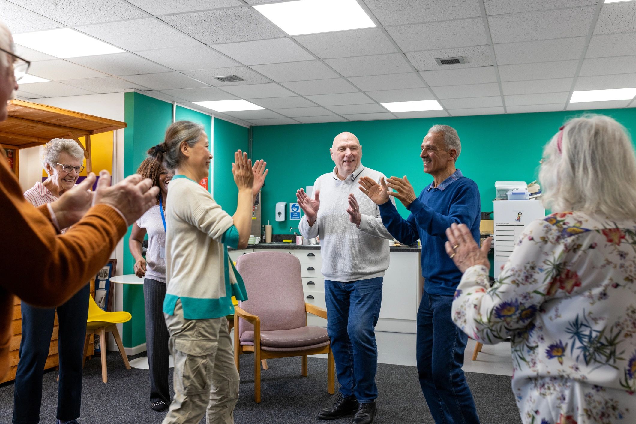 Volunteers and community members engaged in a local support initiative